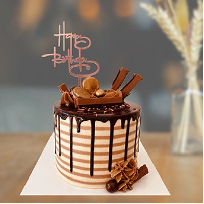 Chocolate Cake With Happy Birthday Topper 